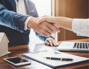 real estate agent shaking hands